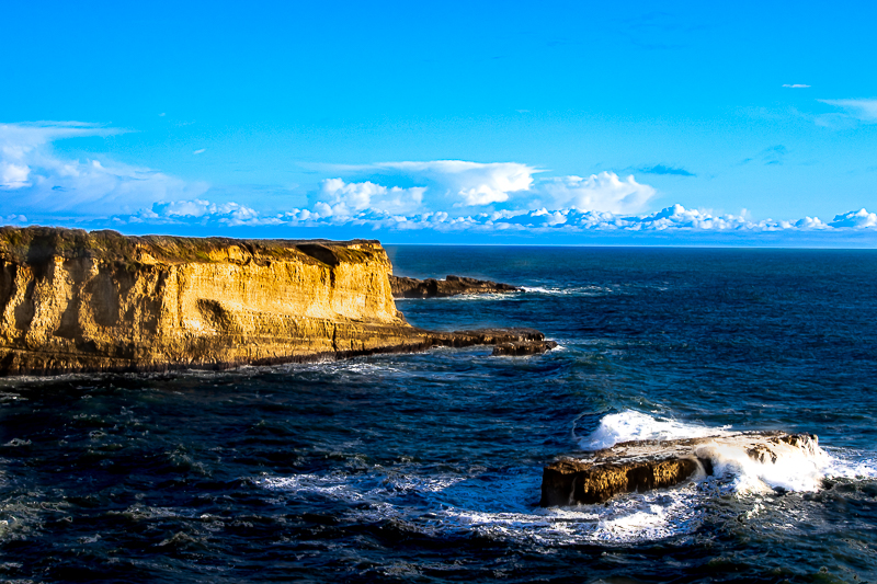 Davenport cliffs — a lone sandstone headland stands over the deep blue Pacific